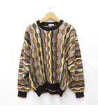 ミズノ MIZUNO Axy ニット セーター ゴルフ 総柄 クルーネック ウール マルチカラー ブラック イエロー ピンク ブラウン ネイビー 黒 黄 茶 L