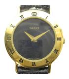 グッチ GUCCI ジャンク品 3000.2.L 腕時計 ウォッチ クォーツ レザーベルト 黒文字盤 ロゴ ゴールド色 ■GY18 /MQ
