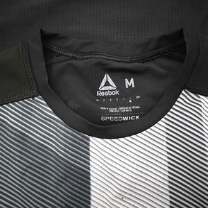 リーボック Reebok 後ろ身頃メッシュ プリント Tシャツ M ブラック メンズ