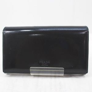 プラダ PRADA 長財布 フラップ 型押しロゴ ブラック 黒 レザー