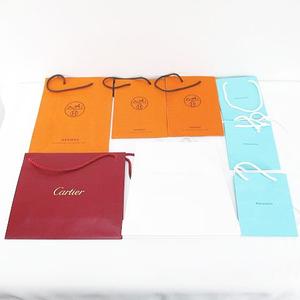 エルメス HERMES 14枚セット 紙袋 ショッパー ショップ袋 純正 付属品 ロゴ デザイン違い サイズ違い カルティエ Cartier / ヴァンクリーフ＆アーペル Van Cleef & Arpels / ティファニー TIFFANY & CO. / ルイヴィトン LOUIS VUITTON / クレ・ド・ポー ボーテ cle de peau / ローラメルシエ LAURA MERCIER オレンジ系 その他