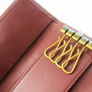 Cartierカルチェの キーケース　 赤茶、未使用品 カルティエ Cartier キーケース 3つ折り レザー 革 ロゴ型押し 4